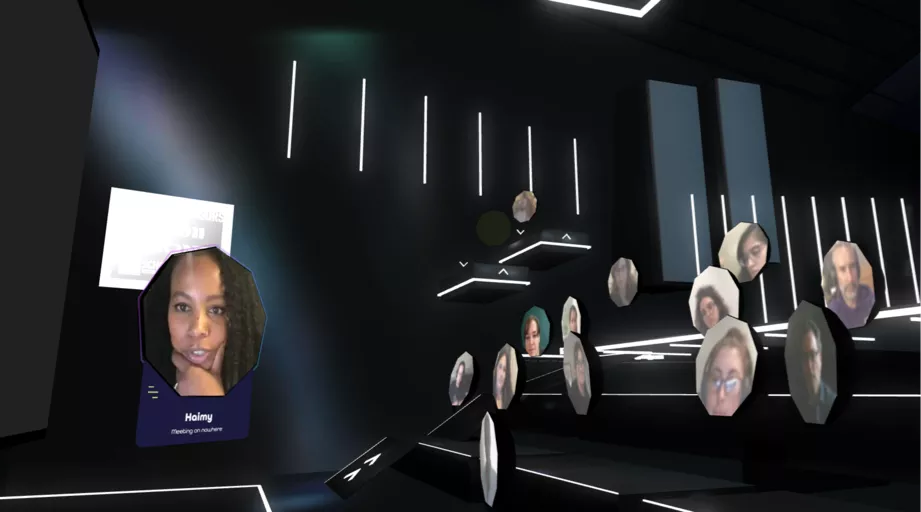 Amplified woman giving a presentation to a crowd of pods.